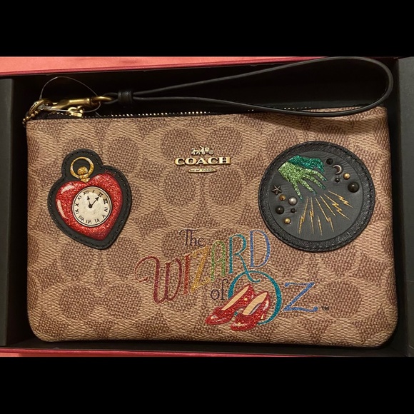 coach wizard of oz wristlet